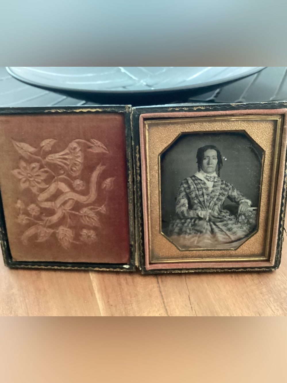 Antique cased mid-19th Century Daguerreotype portrait of a woman seated.
